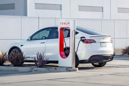 Tesla car at super charger station