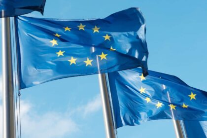 Row of blue European Union flags in Brussels.